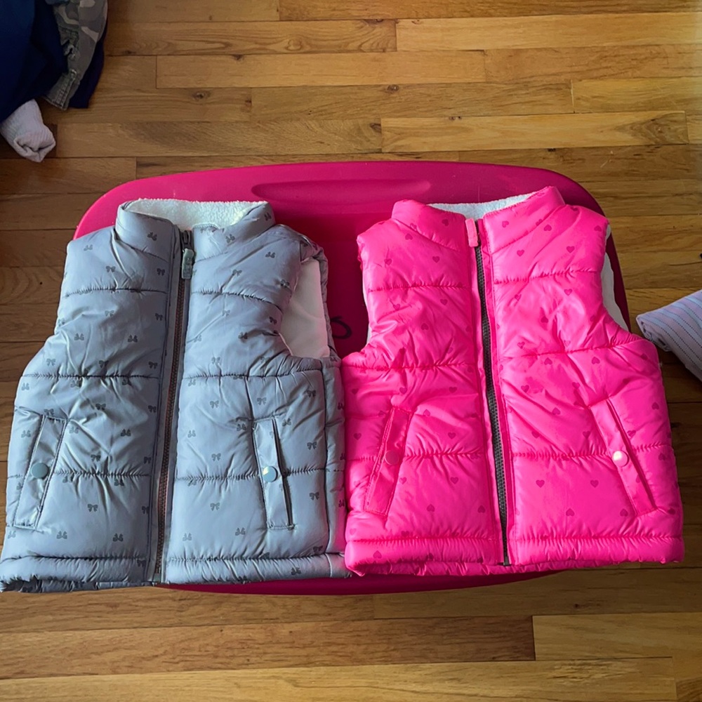 2 Carter’s puffy vests